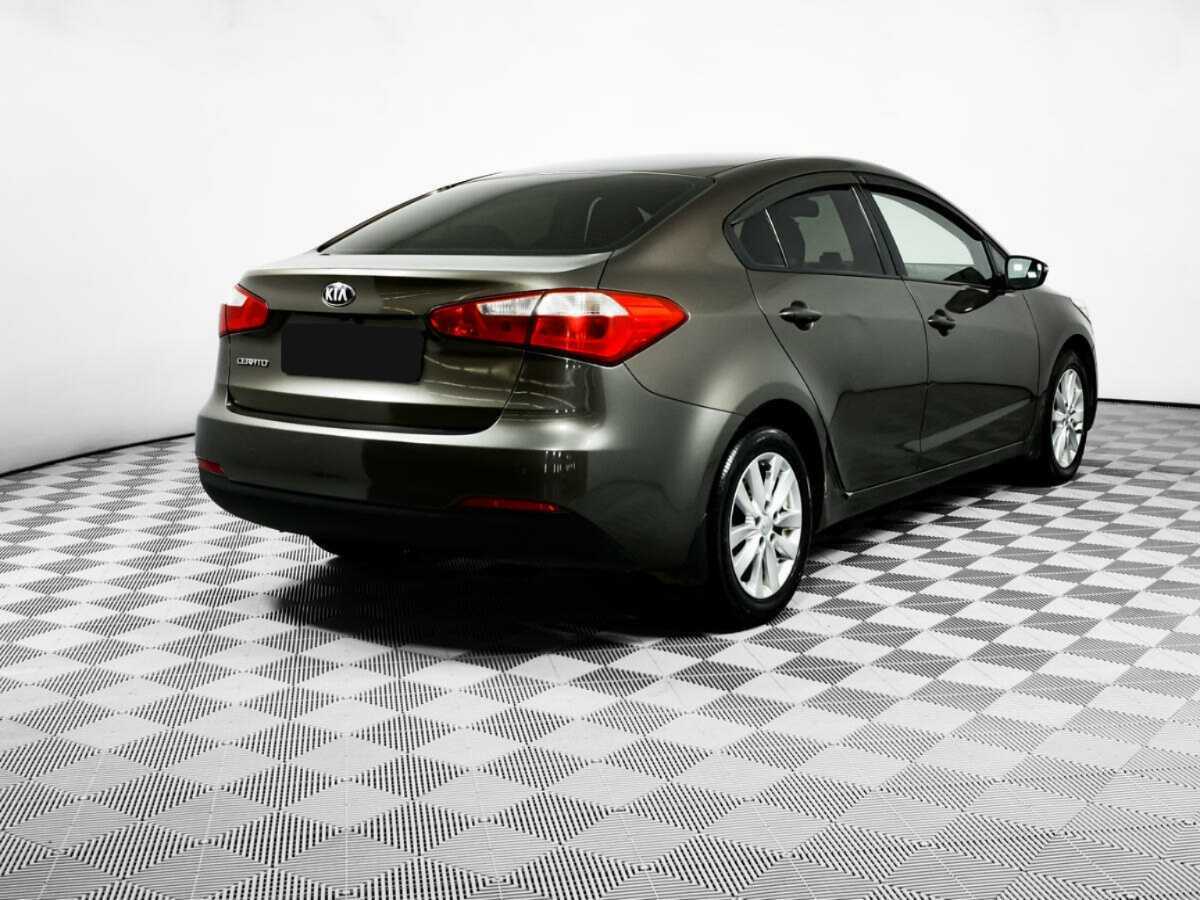 Kia Cerato с пробегом — 2014 год. Фото: #4