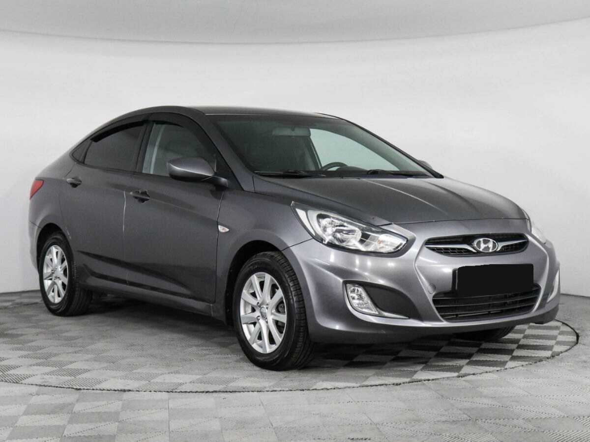 Hyundai Solaris с пробегом — 2013 год. Фото: #2