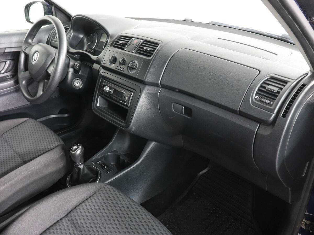 Skoda Fabia с пробегом — 2013 год. Фото: #5