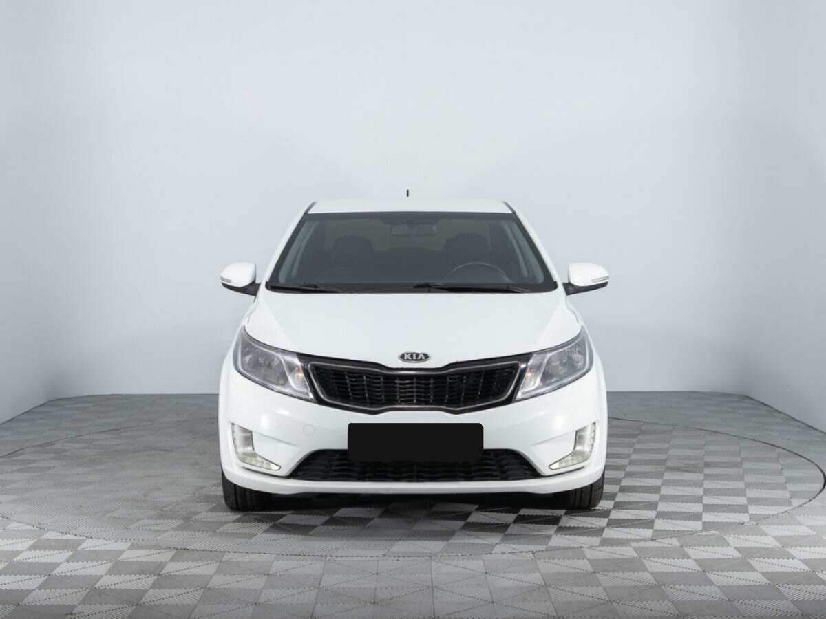 Kia Rio с пробегом — 2012 год. Фото: #1