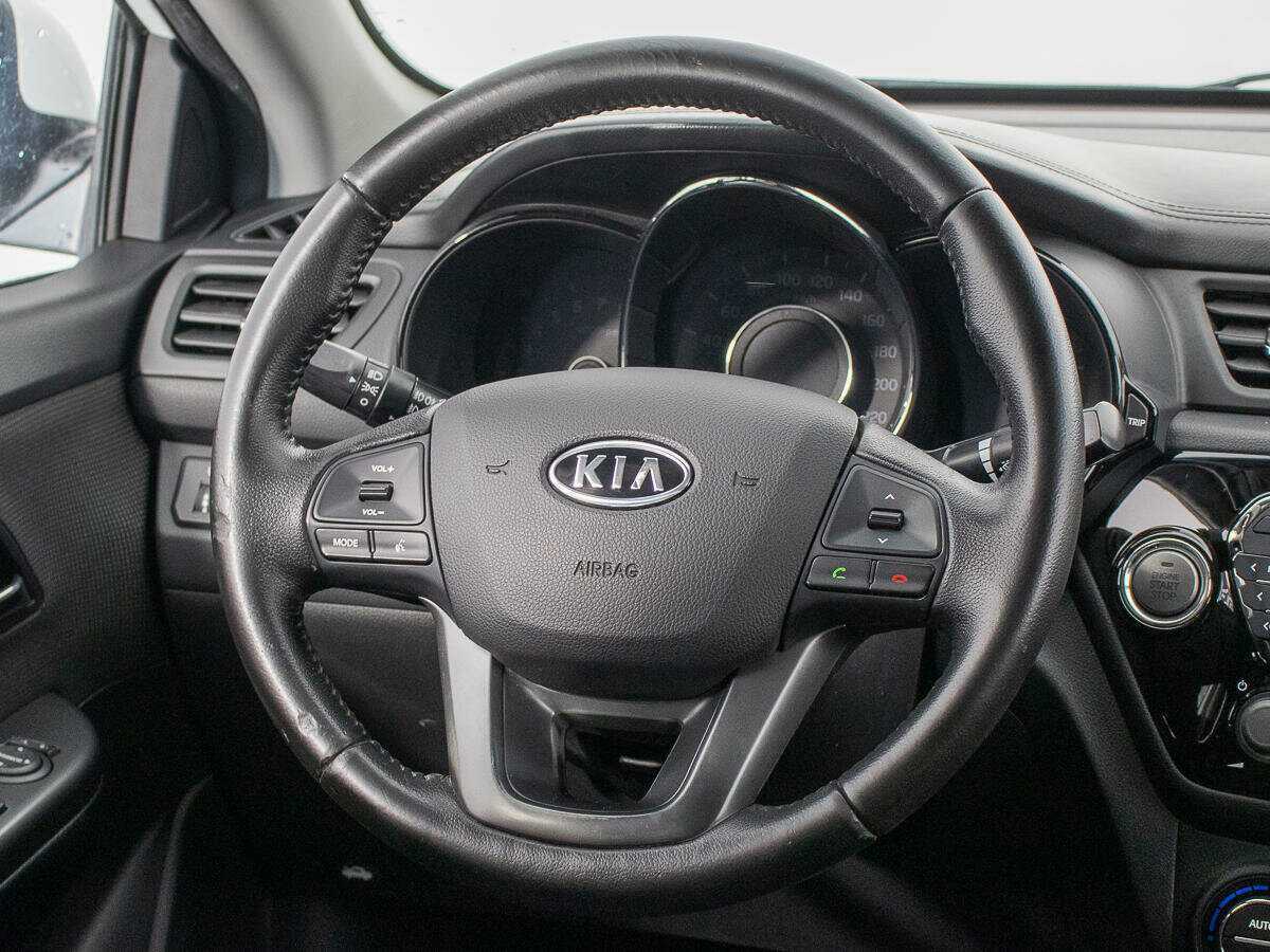 Kia Rio с пробегом — 2012 год. Фото: #14
