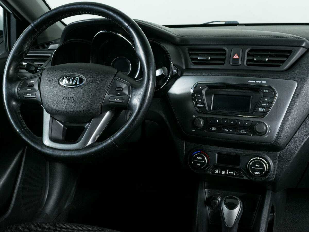 Kia Rio с пробегом — 2013 год. Фото: #9