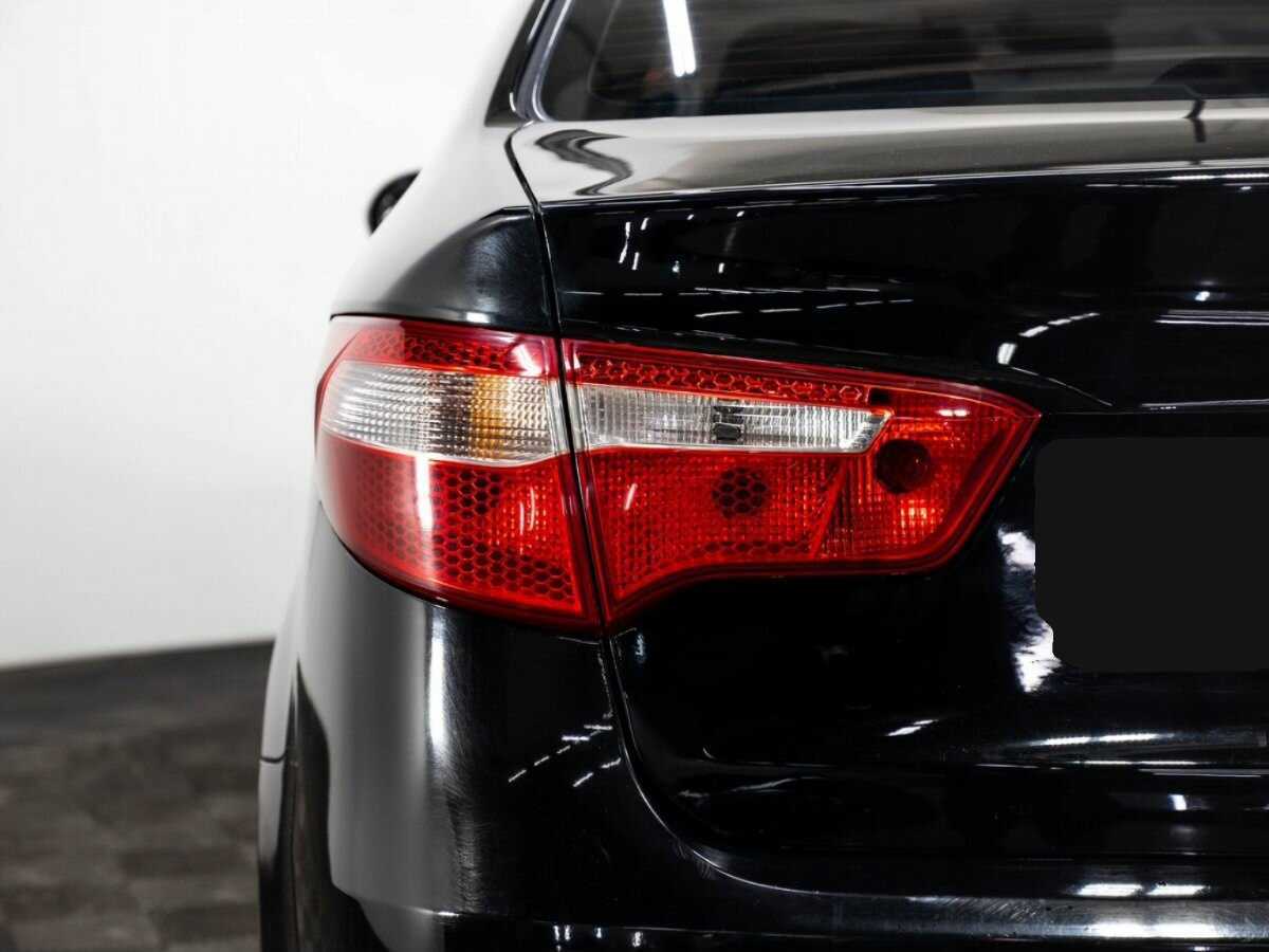 Kia Rio с пробегом — 2013 год. Фото: #6