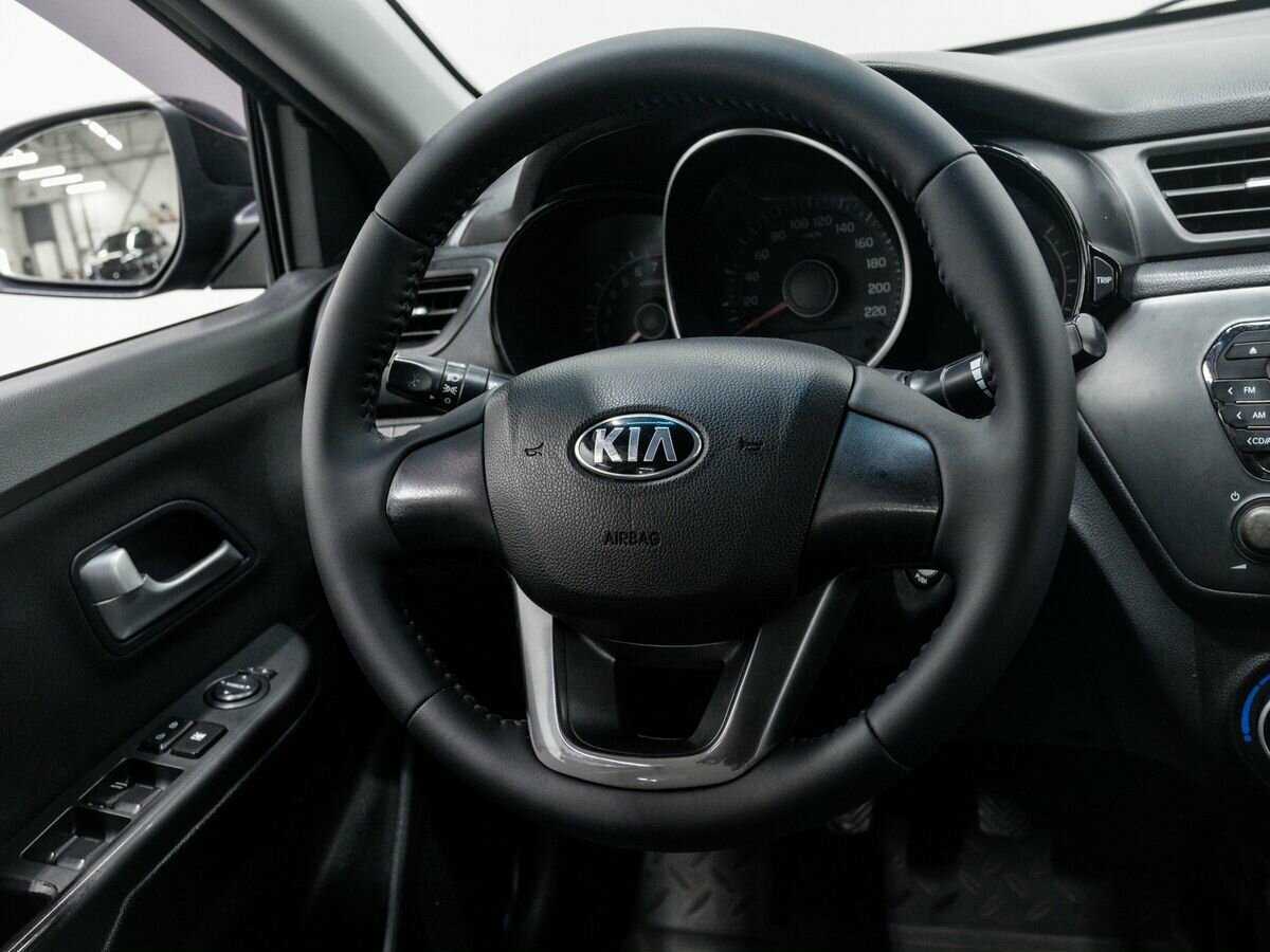 Kia Rio с пробегом — 2013 год. Фото: #11