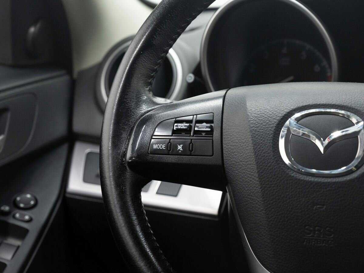 Mazda 3 с пробегом — 2012 год. Фото: #15