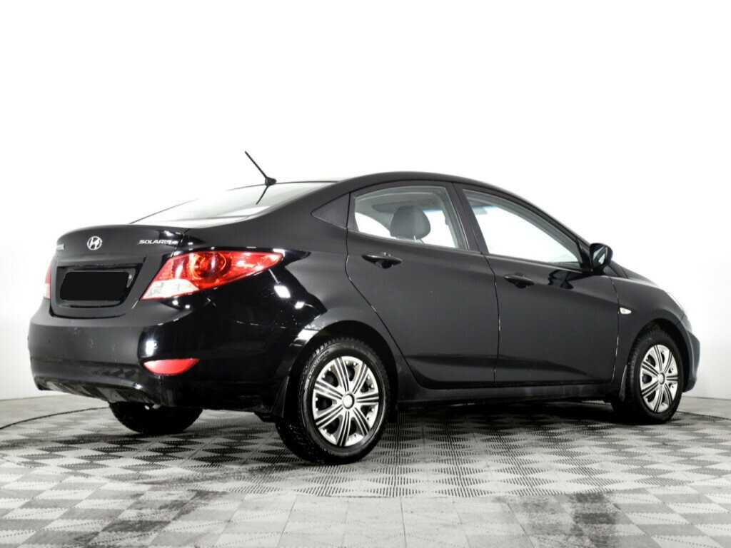 Hyundai Solaris с пробегом — 2012 год. Фото: #2