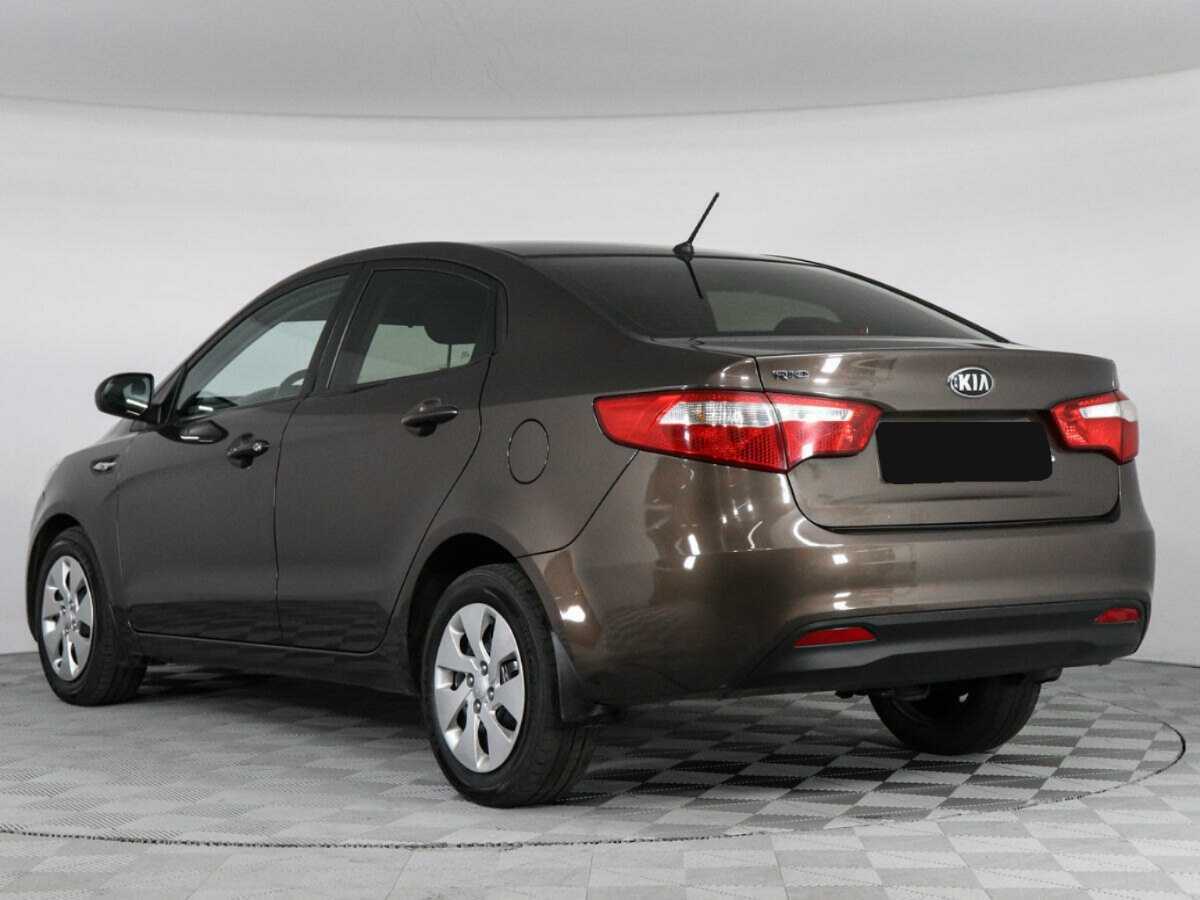 Kia Rio с пробегом — 2014 год. Фото: #6