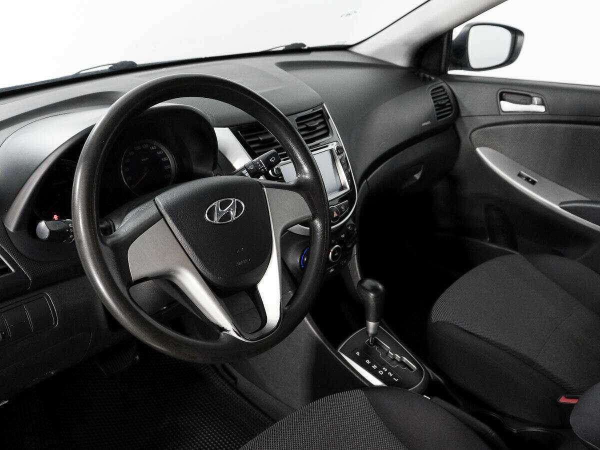 Hyundai Solaris с пробегом — 2013 год. Фото: #8