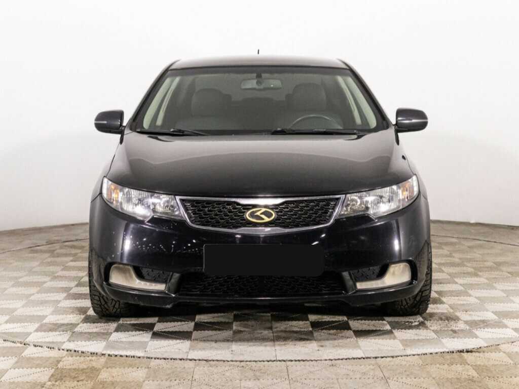 Kia Cerato с пробегом — 2012 год. Фото: #1