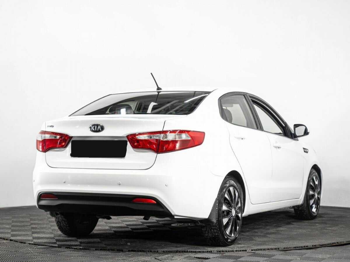 Kia Rio с пробегом — 2013 год. Фото: #3