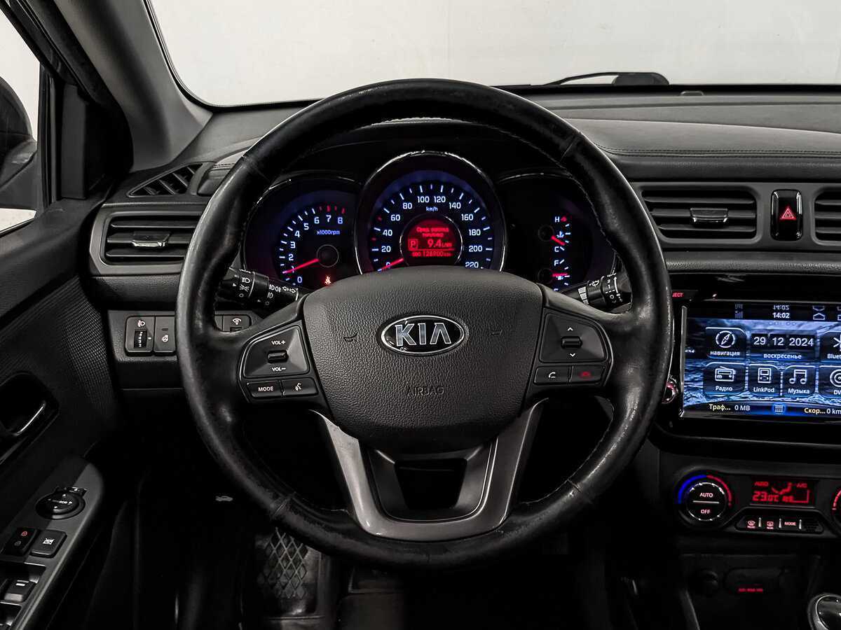 Kia Rio с пробегом — 2014 год. Фото: #21