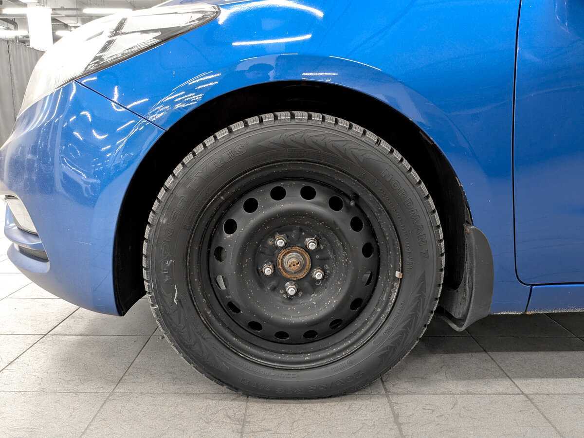 Kia Cerato с пробегом — 2013 год. Фото: #17