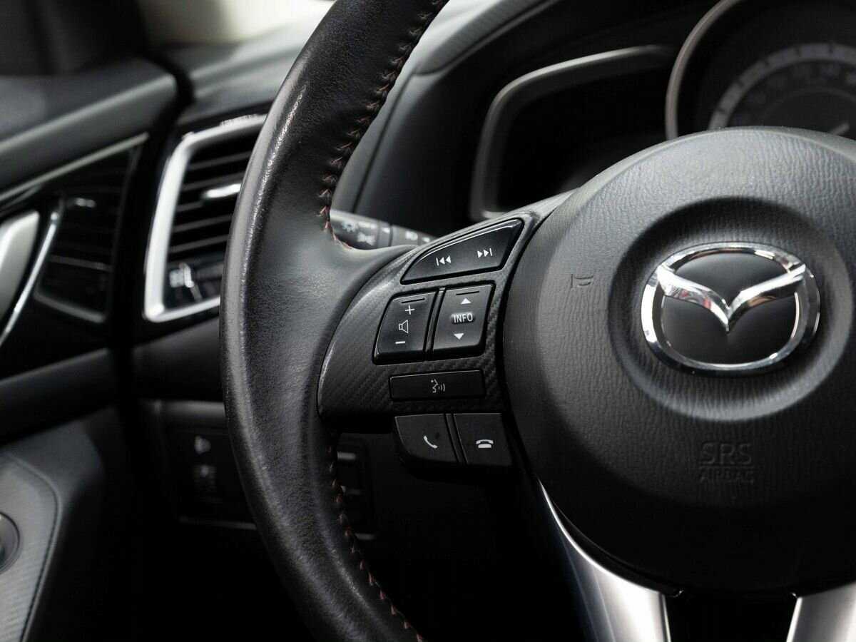 Mazda 3 с пробегом — 2014 год. Фото: #14