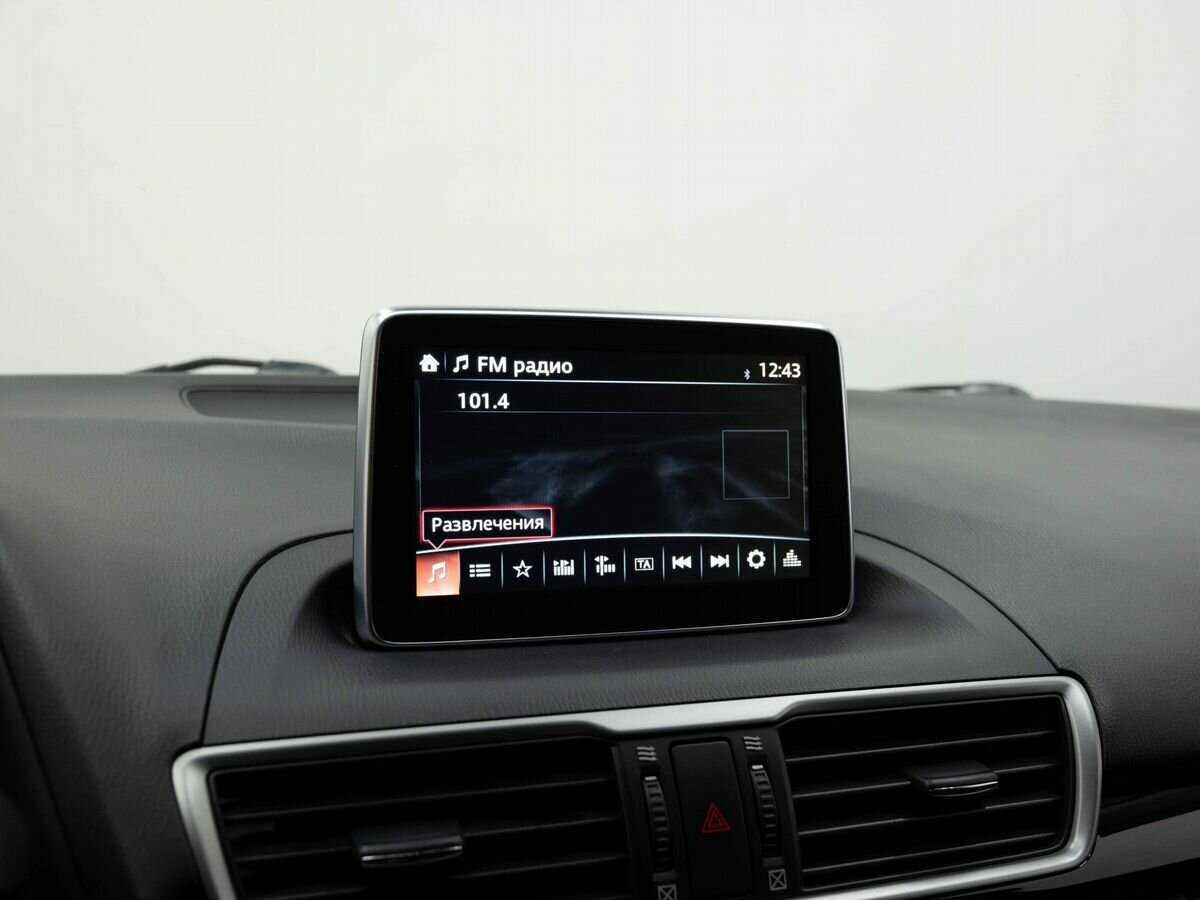 Mazda 3 с пробегом — 2014 год. Фото: #17