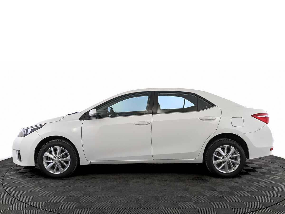 Toyota Corolla с пробегом — 2014 год. Фото: #7