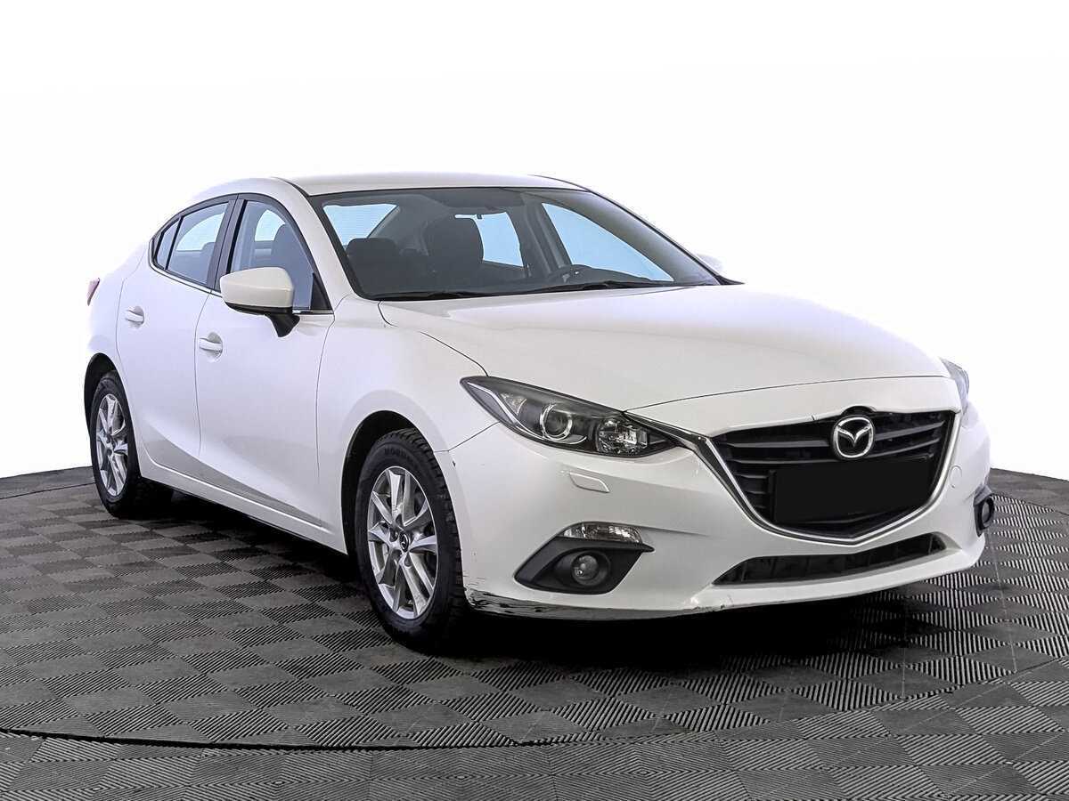 Mazda 3 с пробегом — 2014 год. Фото: #2