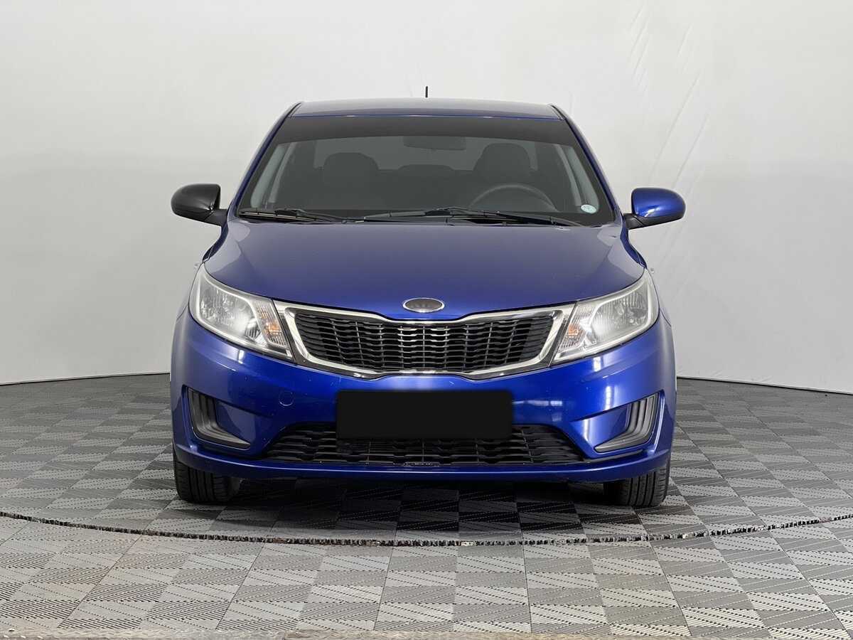 Kia Rio с пробегом — 2013 год. Фото: #1