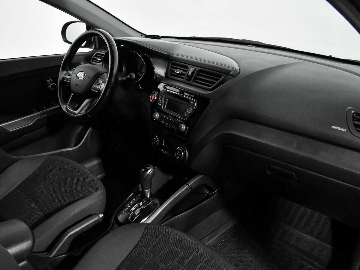 Kia Rio с пробегом — 2013 год. Фото: #13