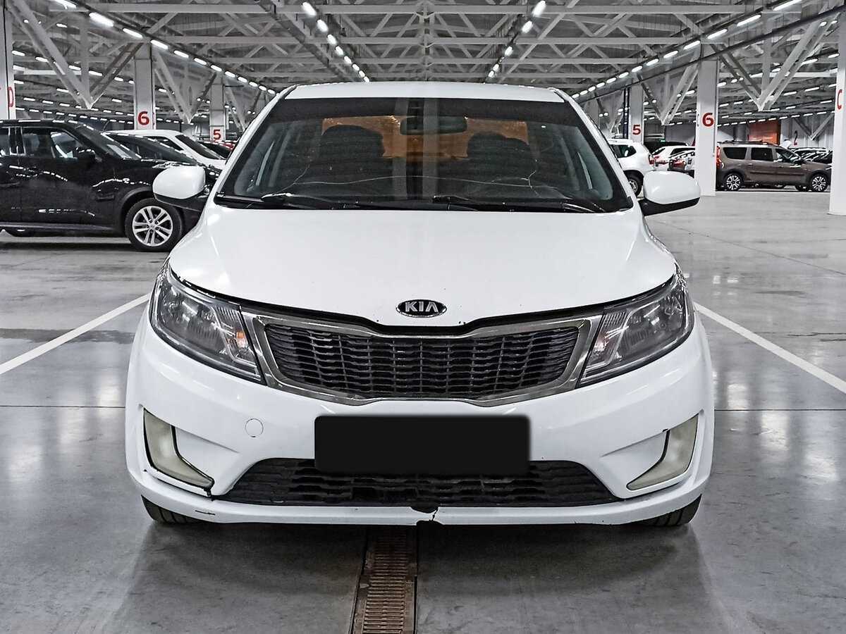 Kia Rio с пробегом — 2014 год. Фото: #1