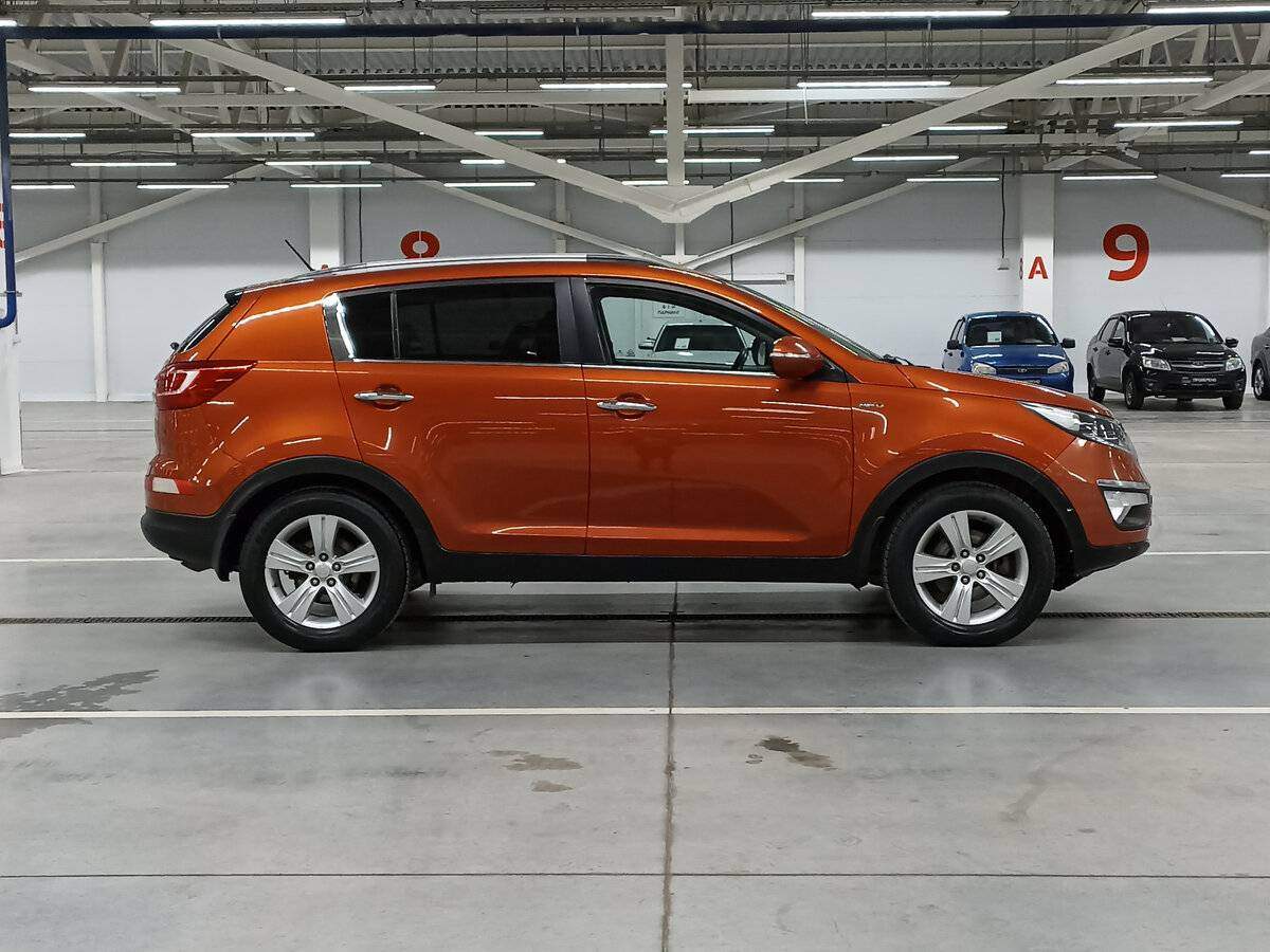 Kia Sportage с пробегом — 2012 год. Фото: #3