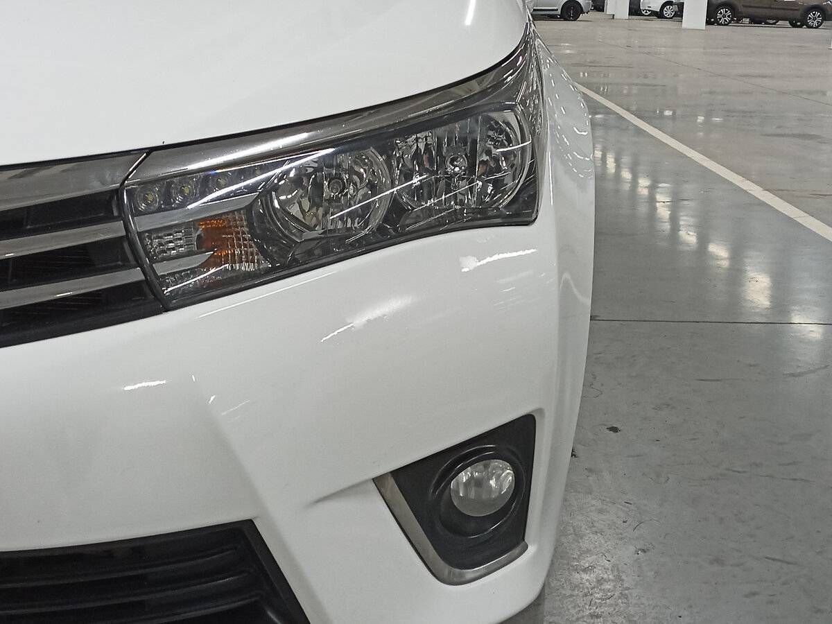 Toyota Corolla с пробегом — 2013 год. Фото: #16