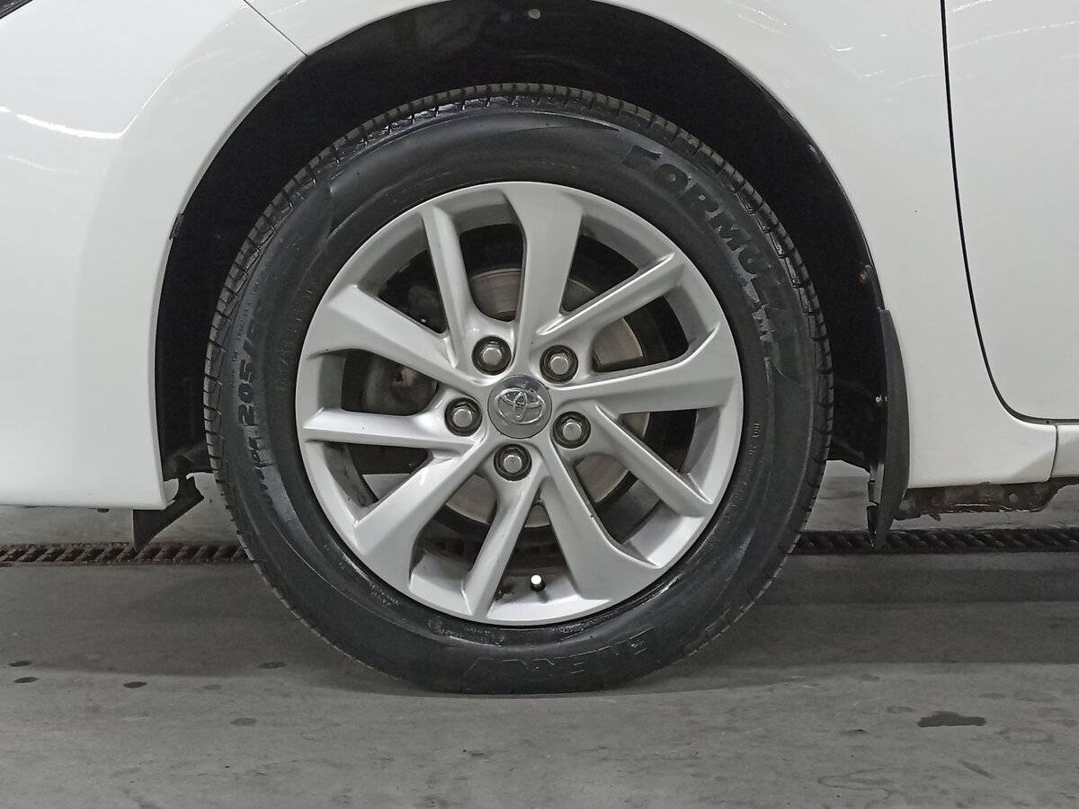 Toyota Corolla с пробегом — 2013 год. Фото: #17