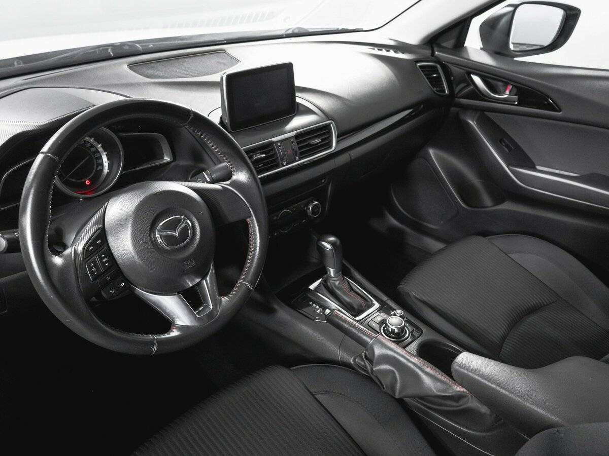 Mazda 3 с пробегом — 2016 год. Фото: #13
