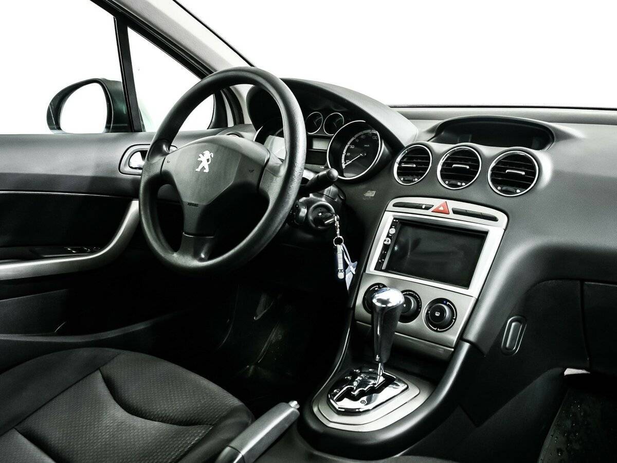 Peugeot 408 с пробегом — 2012 год. Фото: #8