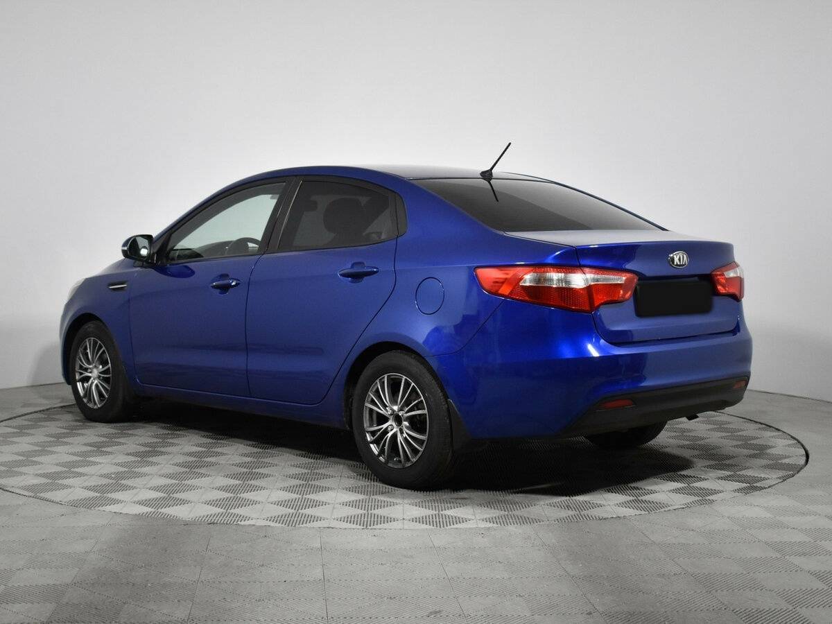 Kia Rio с пробегом — 2013 год. Фото: #6