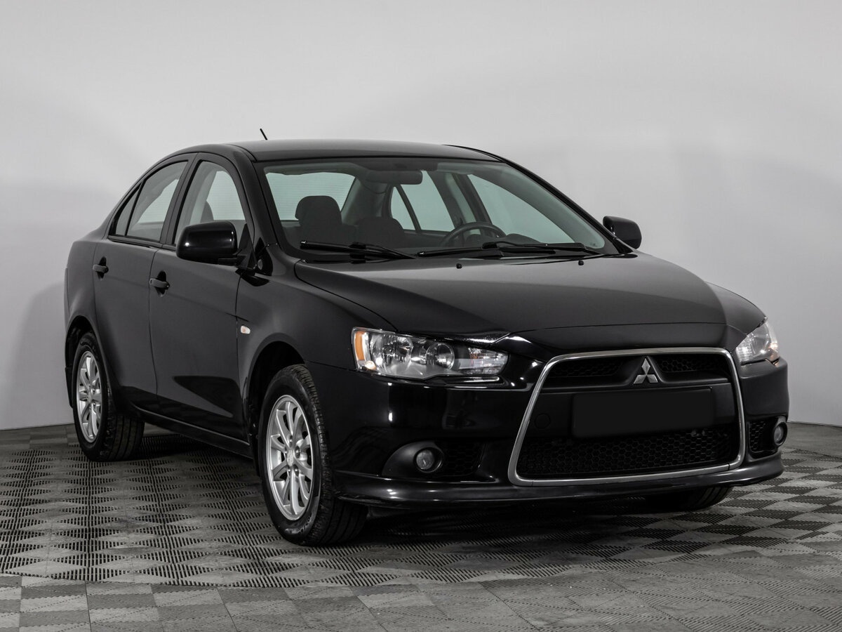 Mitsubishi Lancer с пробегом — 2012 год. Фото: #2