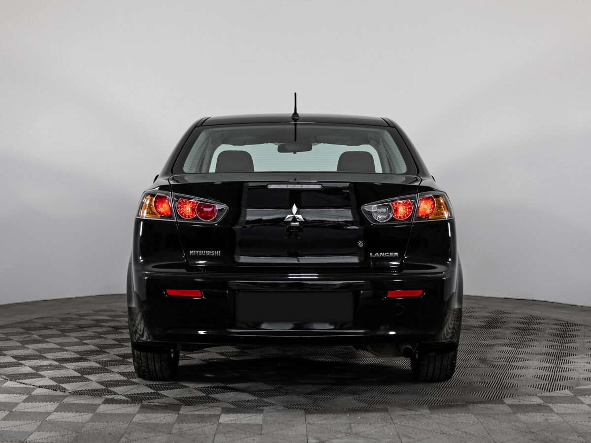 Mitsubishi Lancer с пробегом — 2012 год. Фото: #4