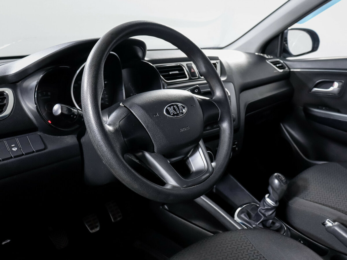 Kia Rio с пробегом — 2013 год. Фото: #11