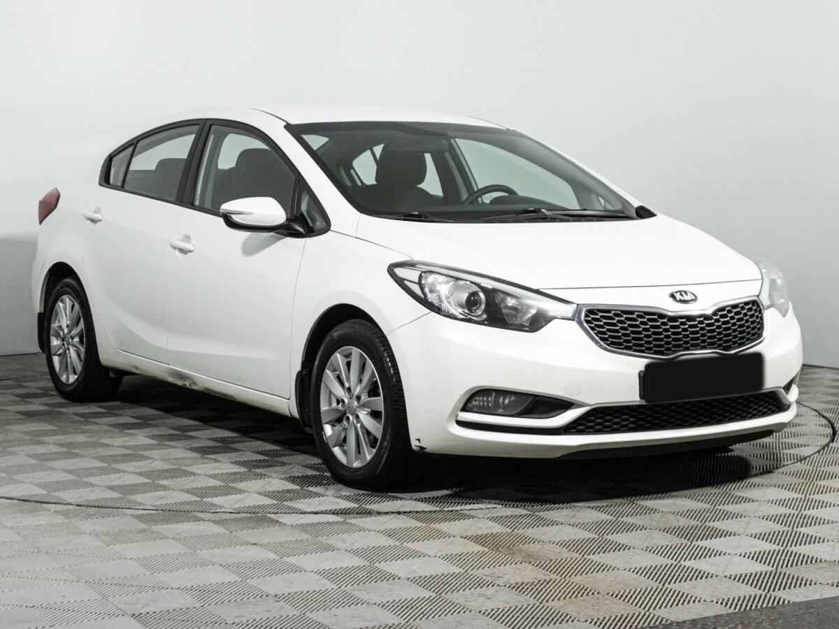 Kia Cerato с пробегом — 2015 год. Фото: #2