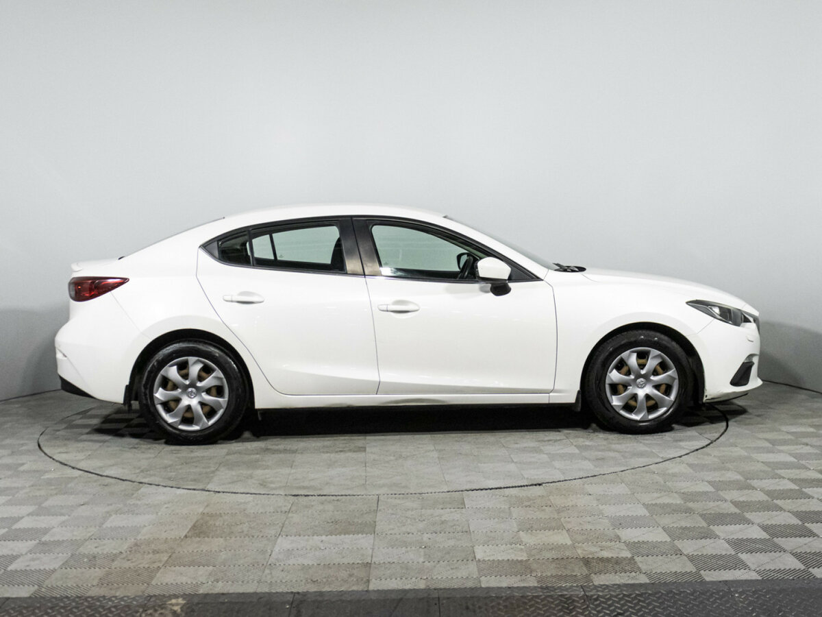 Mazda 3 с пробегом — 2014 год. Фото: #3