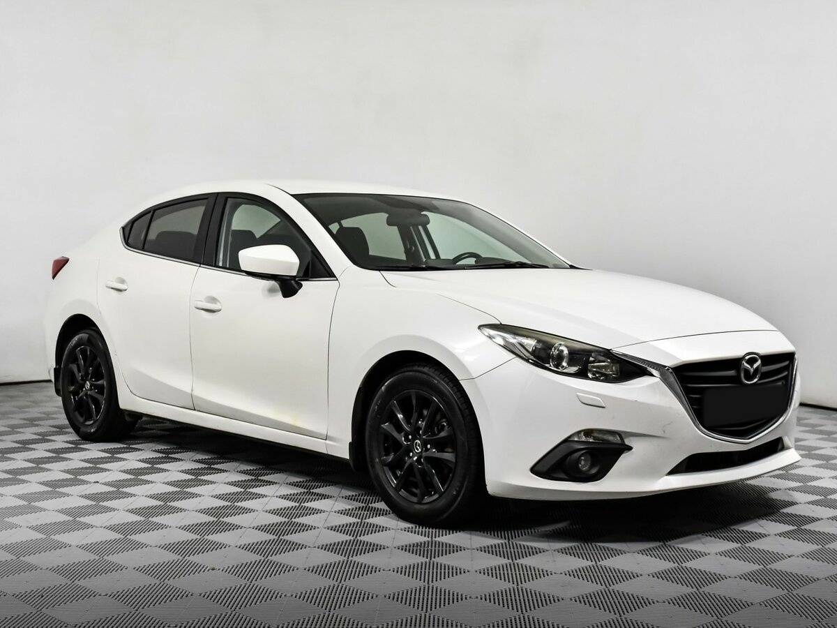 Mazda 3 с пробегом — 2014 год. Фото: #2