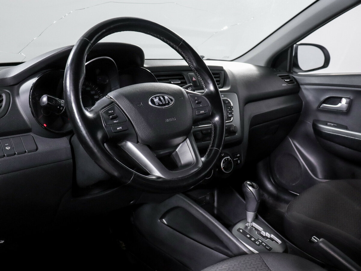 Kia Rio с пробегом — 2014 год. Фото: #11