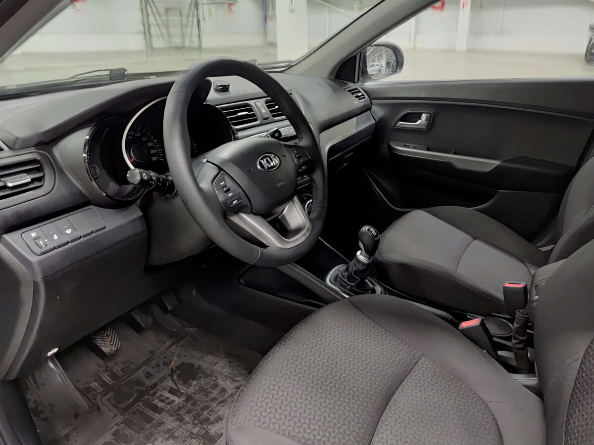 Kia Rio с пробегом — 2014 год. Фото: #14