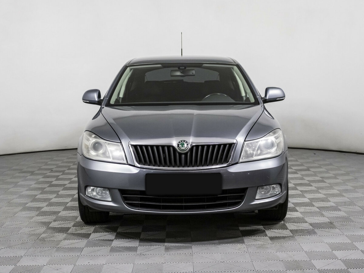 Skoda Octavia с пробегом — 2013 год. Фото: #1