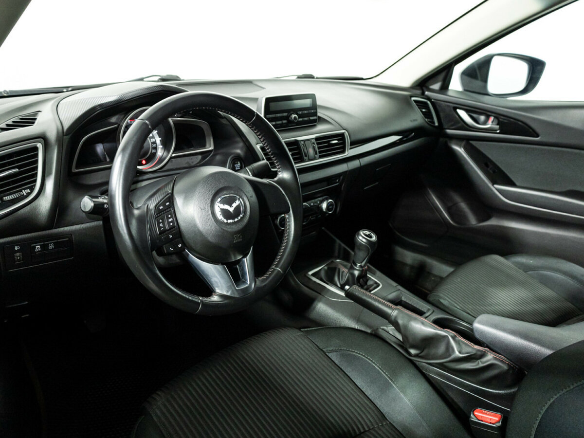 Mazda 3 с пробегом — 2014 год. Фото: #10
